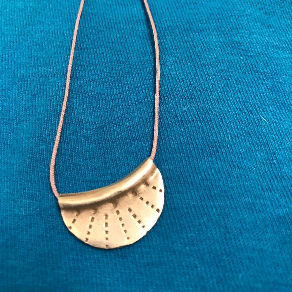 Sterling Silver Sun disk pendant on nylon cord